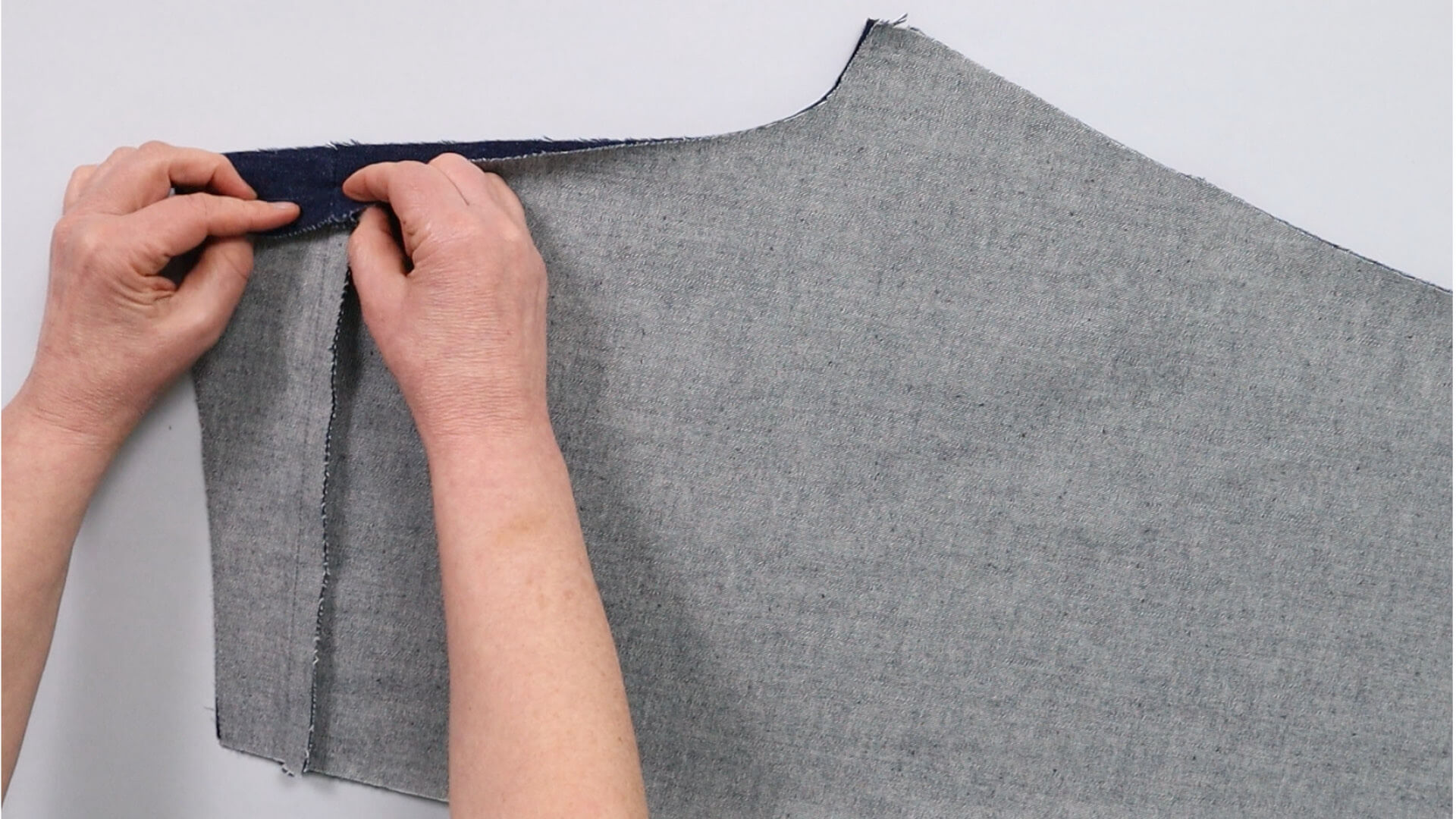 Pin the back together with yoke seams matching