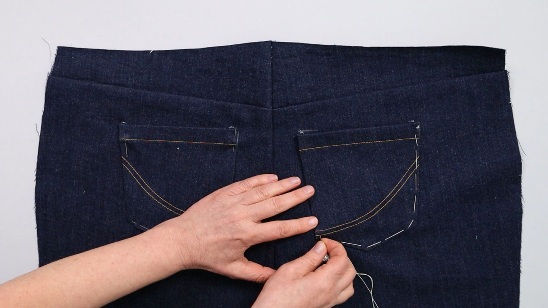smartPATTERN sewing instructions for preparing a pair of jeans for fitting - pin or baste on back pockets