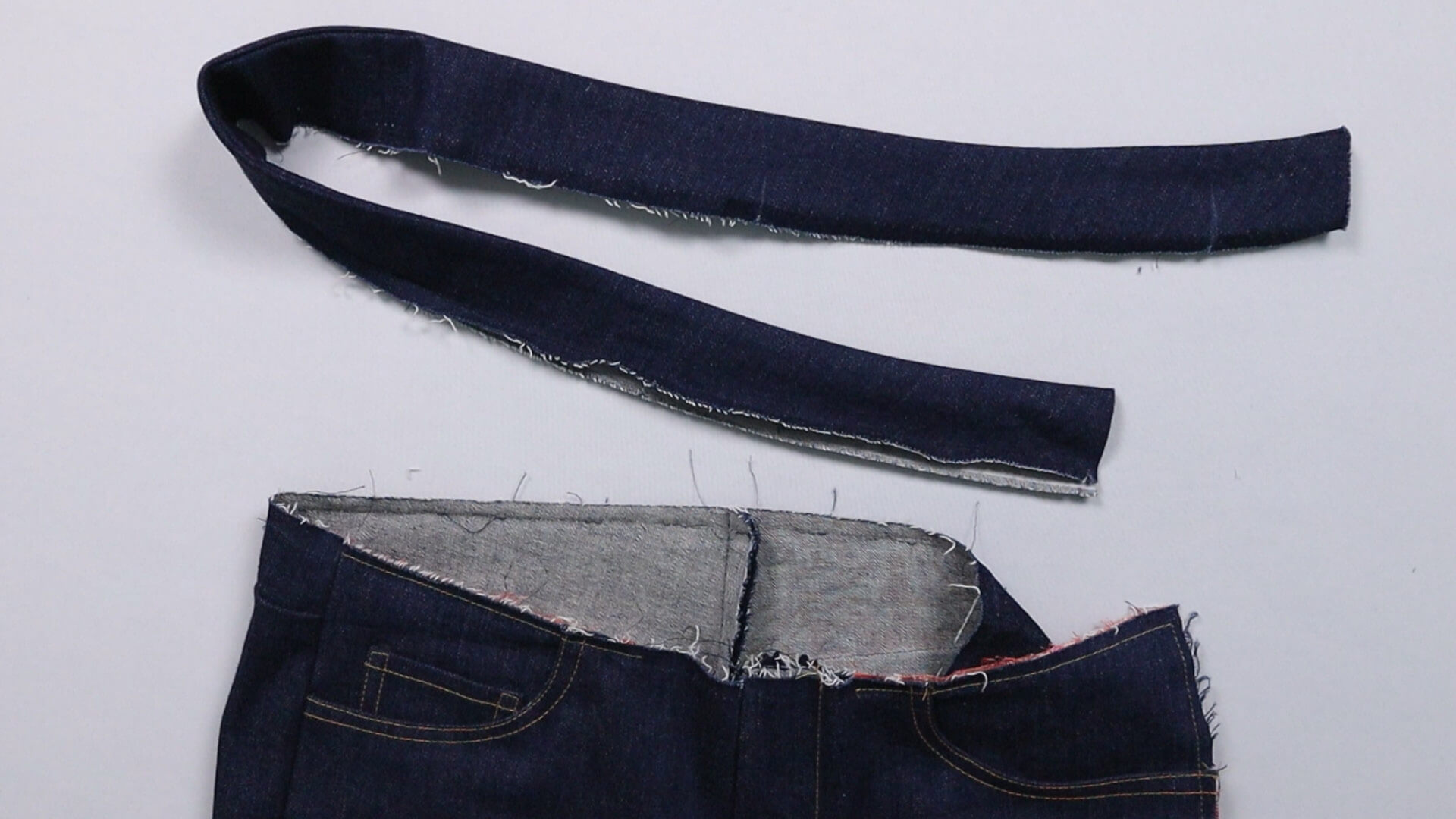 The picture shows the detached waistband strip.