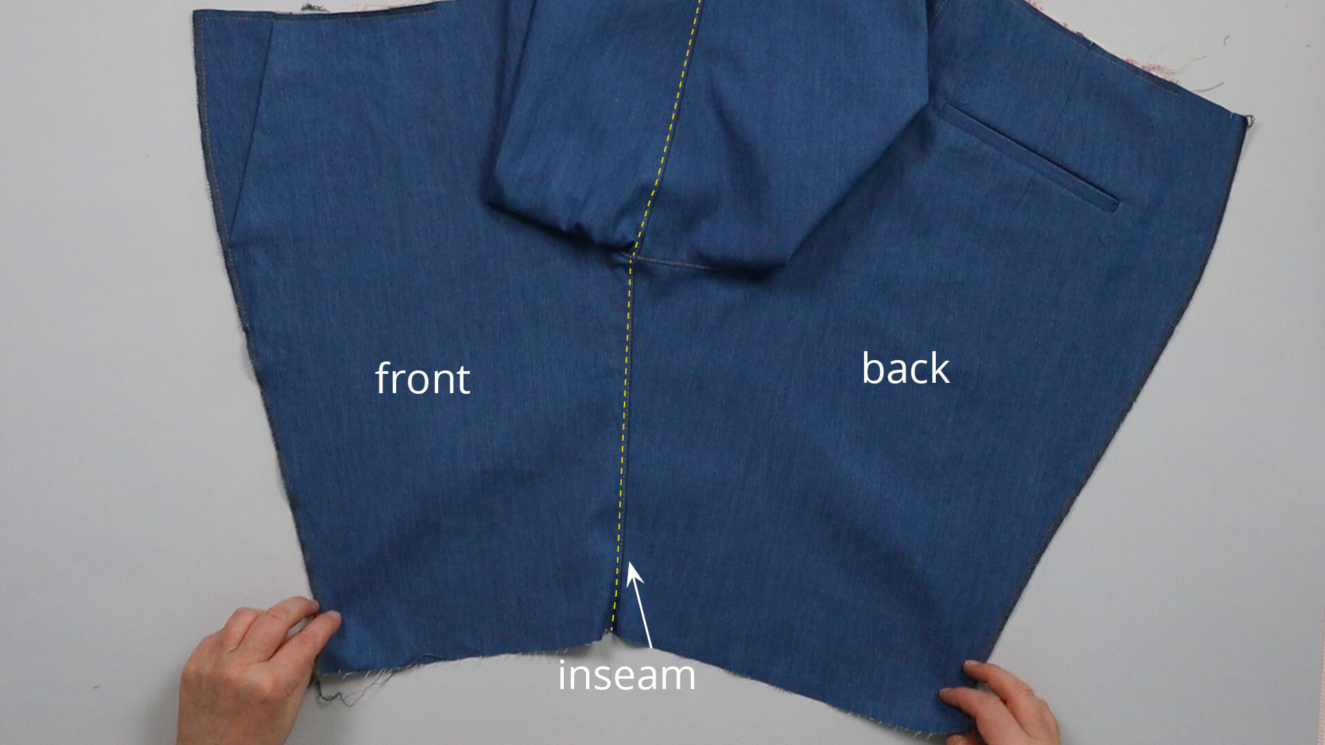 The picture shows the decorative stitching on the inside leg seam.