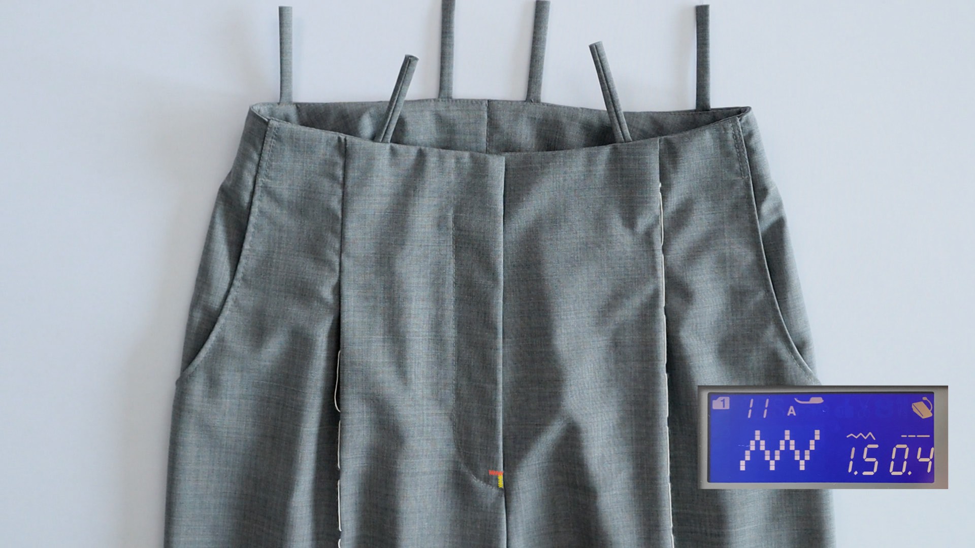 Hosenschlitz mit Reißverschluss und angeschnittenen Bund nähen - Schlitzende nähen